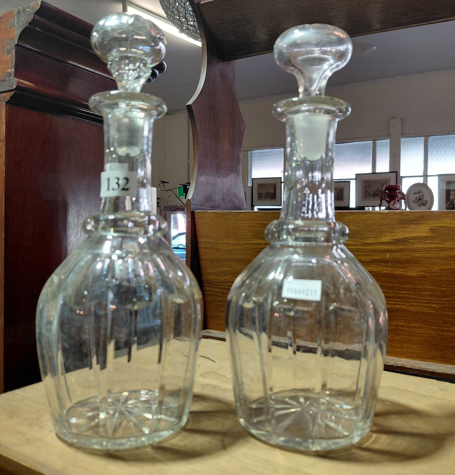 132 · A MATCHED PAIR OF ANTIQUE DECANTERS