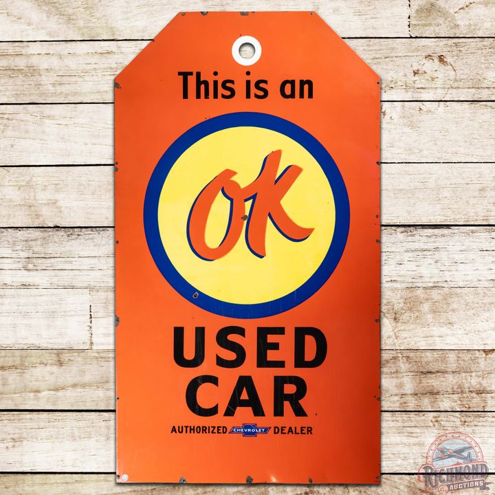 This is an OK Used Car Authorized Chevrolet Dealer 6' Die Cut SS Porcelain Tag Shaped Sign
