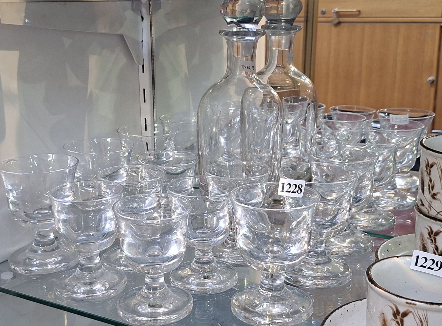1228 · CRYSTAL DECANTER AND GOBLETS