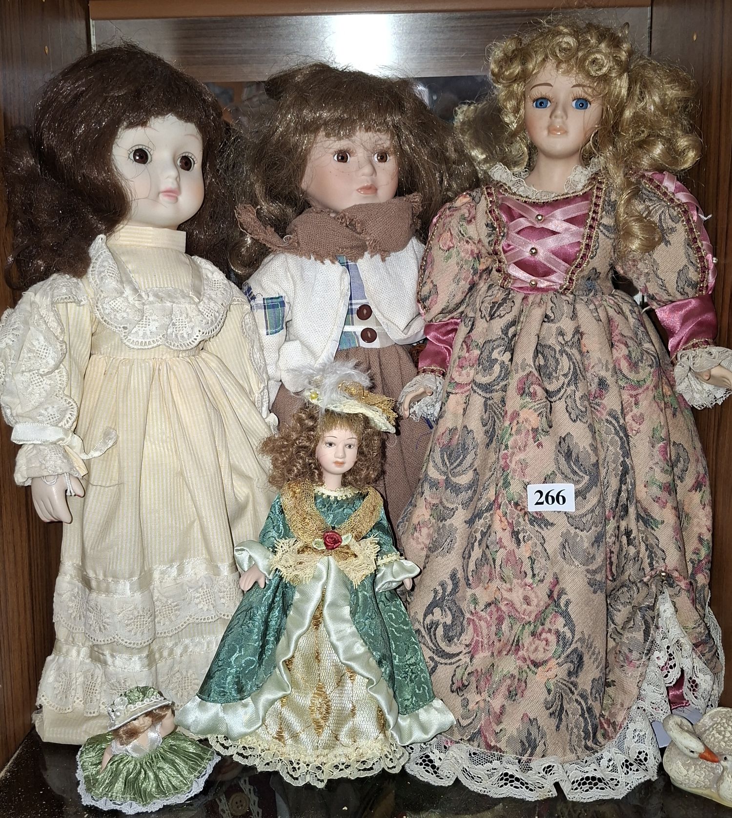 266 · FOUR DOLLS