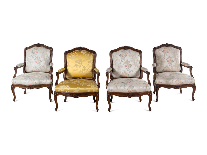 A Set of Four Louis XV Style Walnut Fauteuils