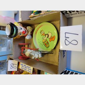 Donald Duck plate, cast iron horse and clown vase