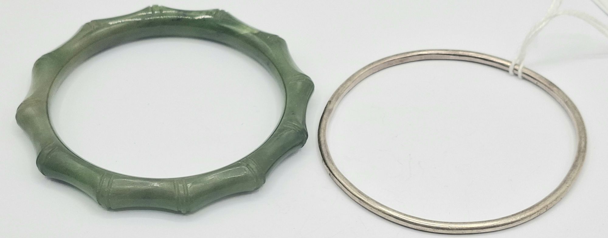 1173 · STERLING SILVER AND JADE BANGLES