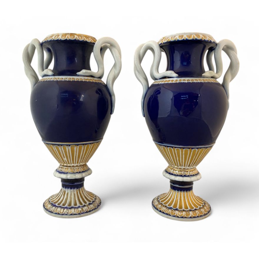 A pair of 19th century Meissen type neo-classical style cobalt blue and parcel gilt vases with snake