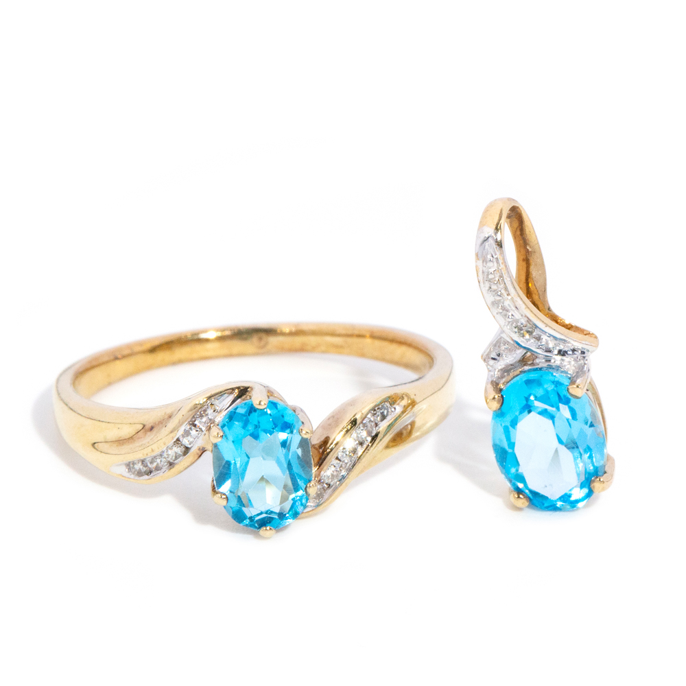 148 · 9 Carat Yellow Gold Blue Topaz and Diamond Pendant and Ring