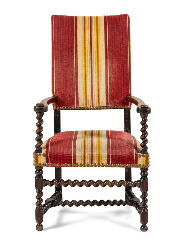 A William and Mary Style Carved Walnut Armchair
