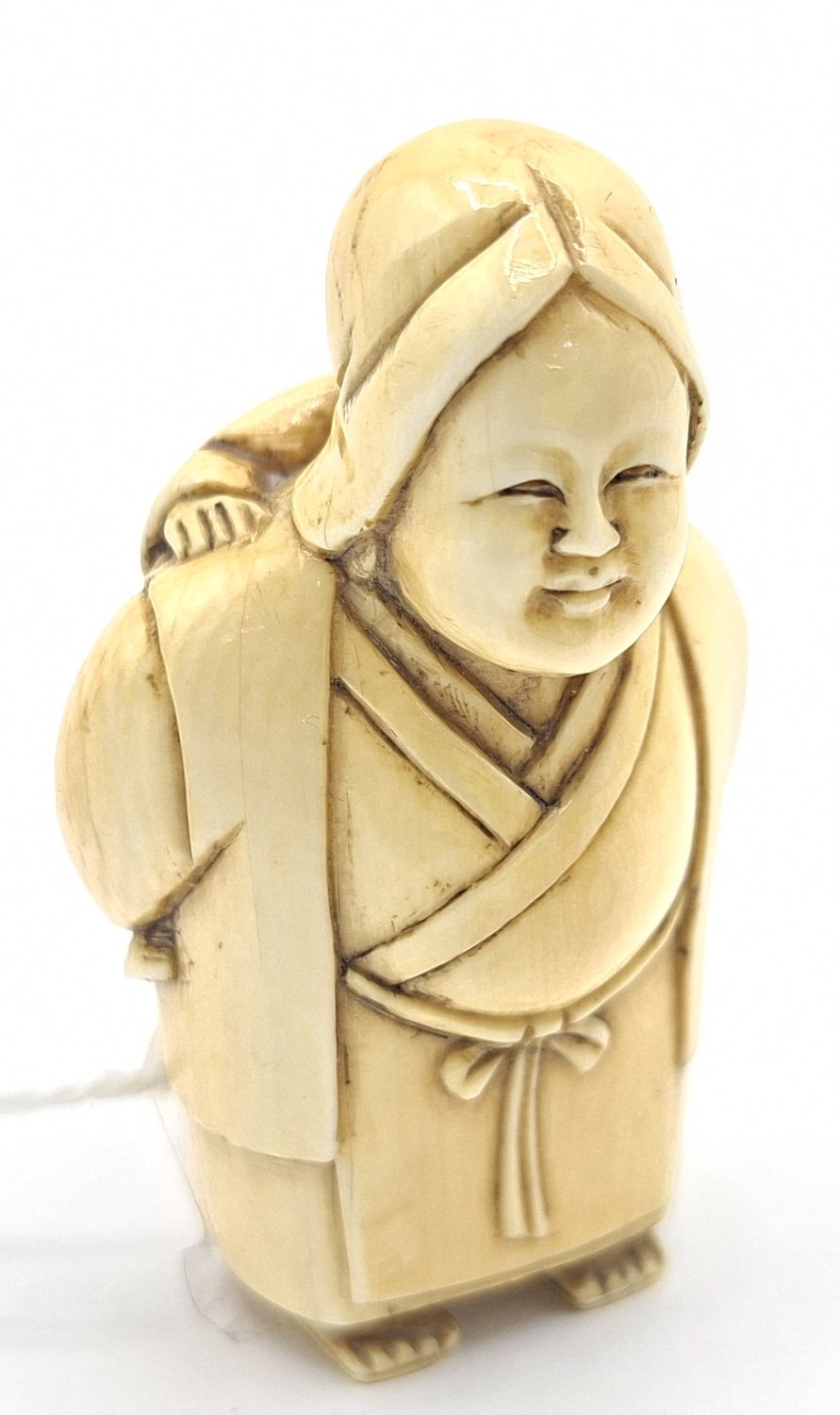82 · CARVED JAPANESE IVORY NETSUKE