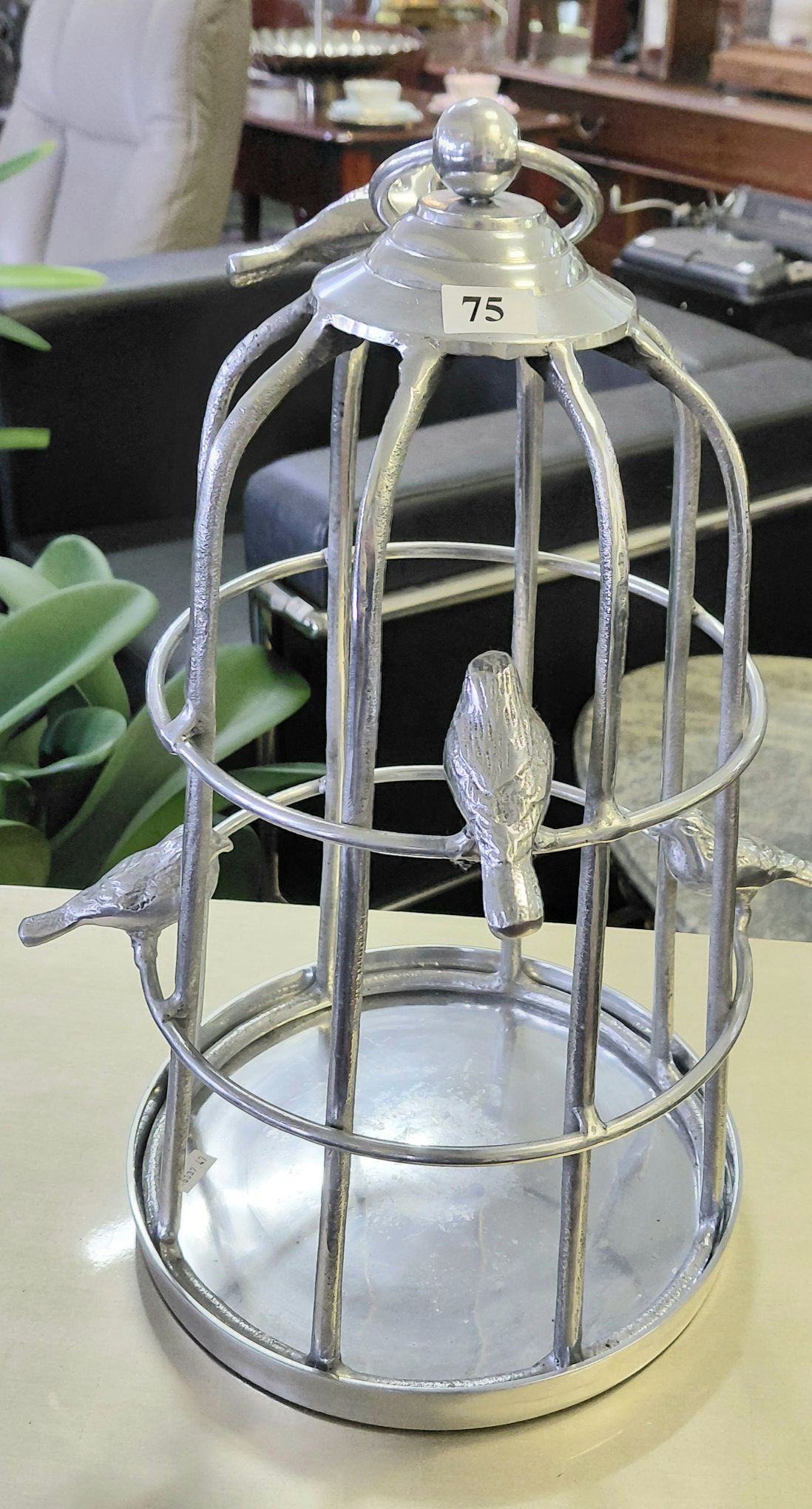 75 · BIRD CAGE CHROME DISPLAY