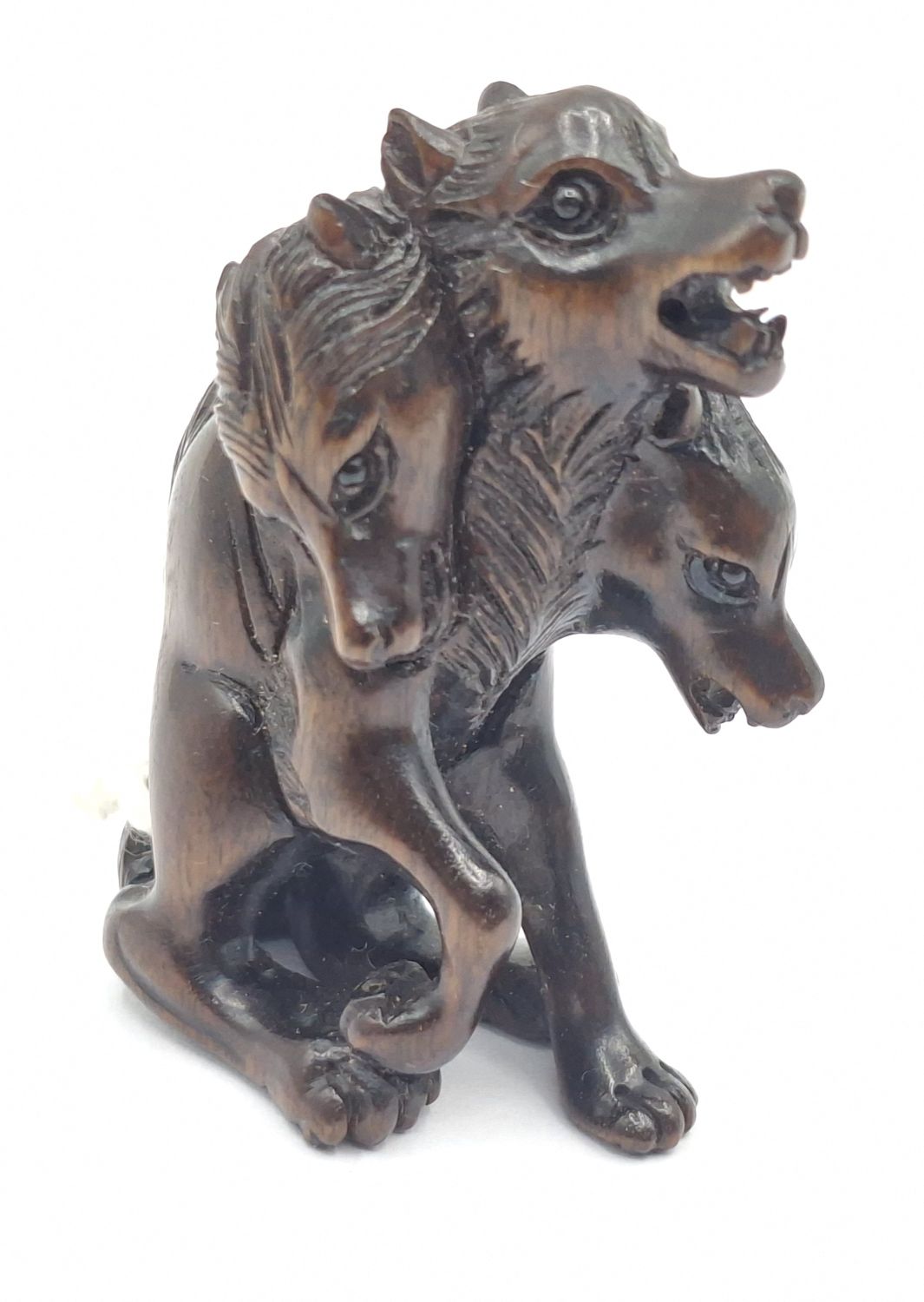 127 · JAPANESE CARVED ROSEWOOD NETSUKE