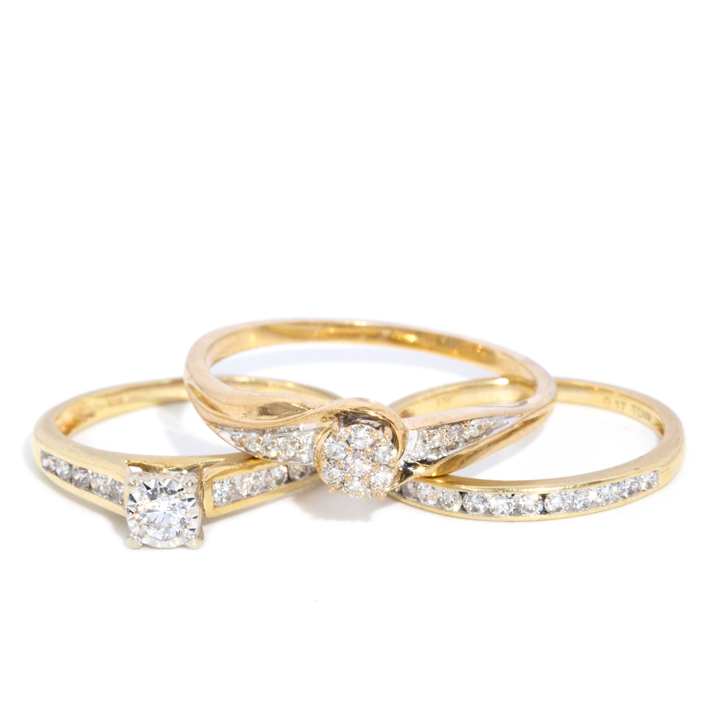 95 · Three Yellow Gold Diamond Rings