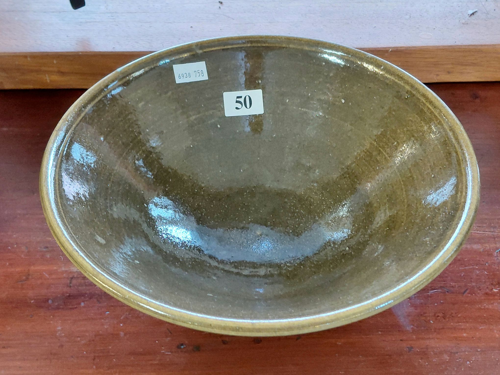 50 · SIGNED POTTERY SERVING BOWL