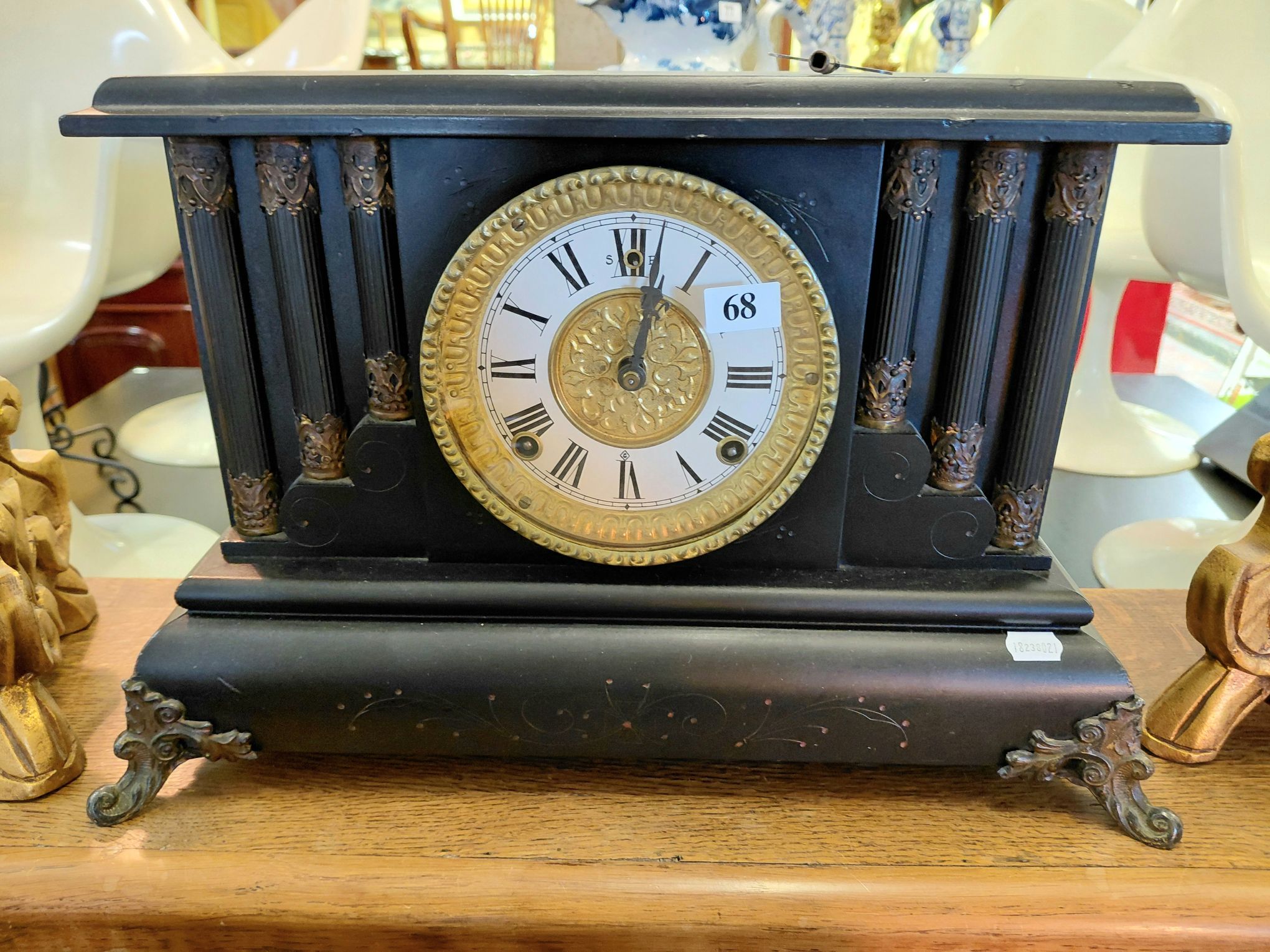 68 · EBONISED WOODEN MANTLE CLOCK