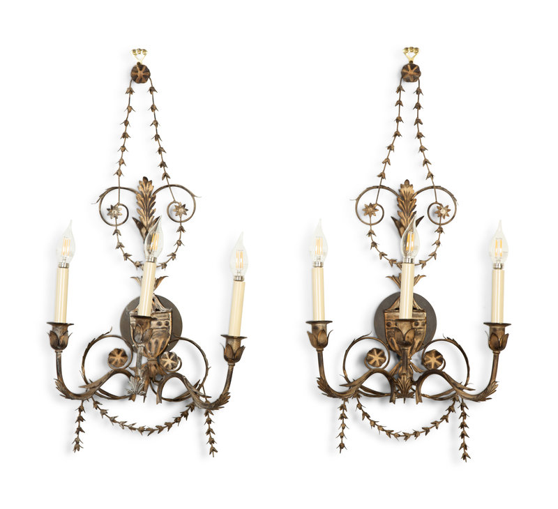 A Set of Four Neoclassical Style Pressed Metal Two-Light Sconces
Height 29 inches.