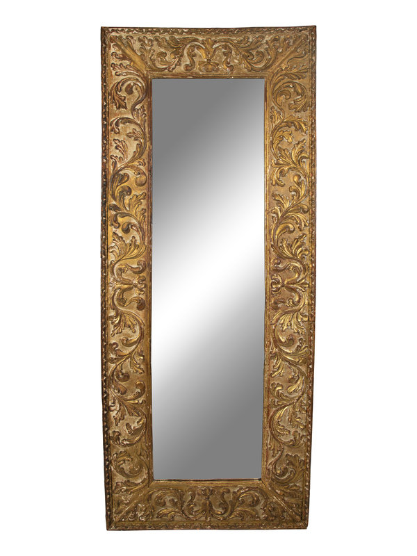 A Continental Rococo Style Foliate Carved Giltwood Framed Floor Mirror
Height 90 3/4 x depth 37 1/2 inches.