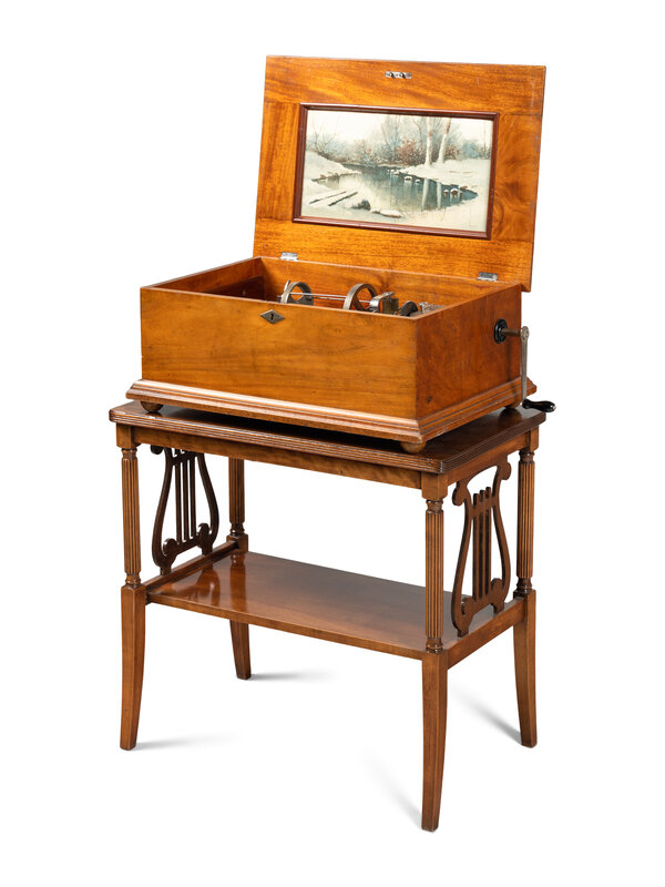 A Capitol B Cuff Music Box with Table, by F.G. Otto & Son