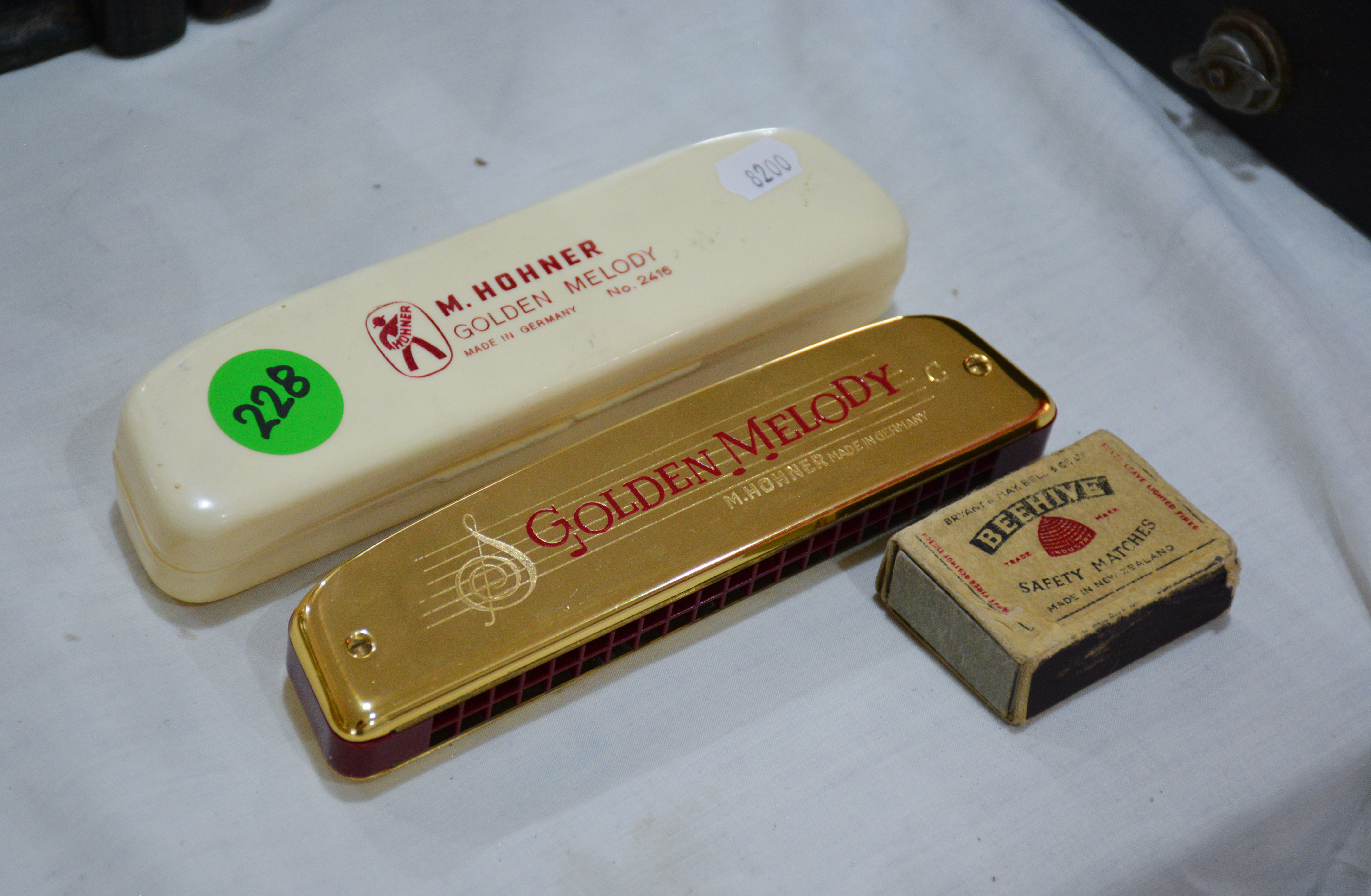 M. Hohner Golden Melody Harmonica and Case — sold at auction in New Zealand for $25