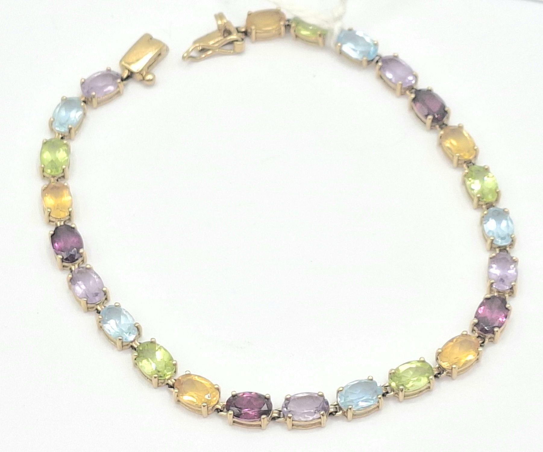 314 · 9CT GOLD GEMSTONE BRACELET