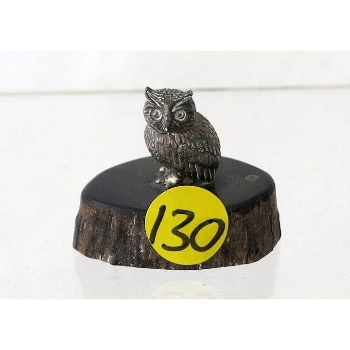 A STERLING SILVER SCULPTURE OF AN OWL, maker Patrick Mavros,