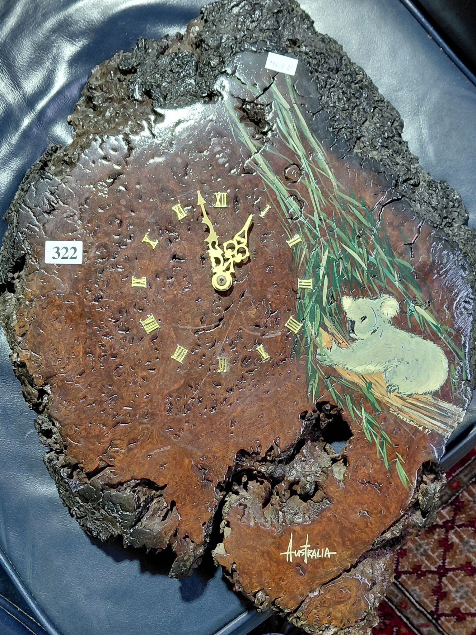 322 · WOODEN BURL WALL CLOCK