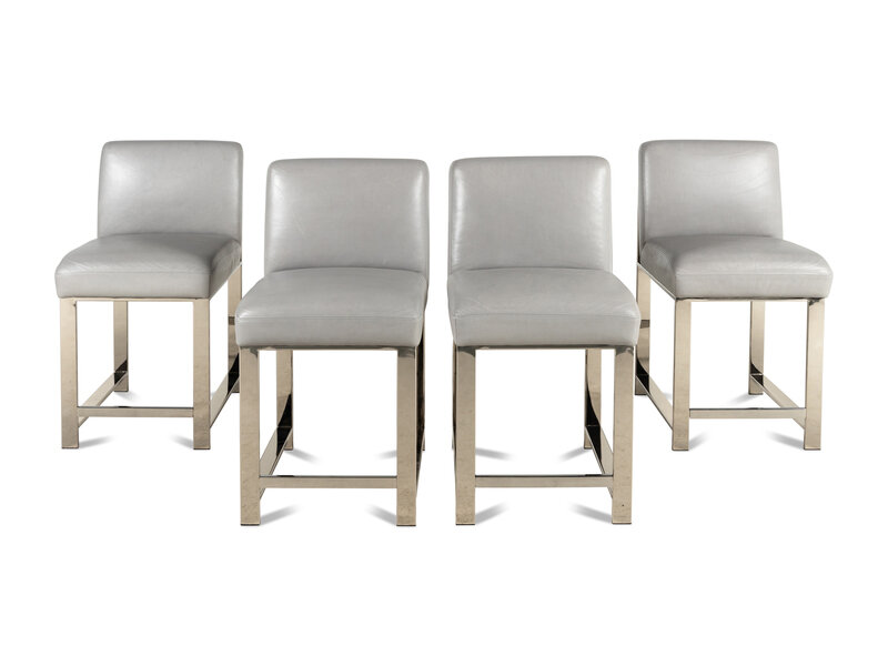 A Set of Four Contemporary Leather-Upholstered Chairs