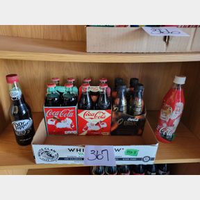 3 four packs + 2 bottles Collectible Coke products