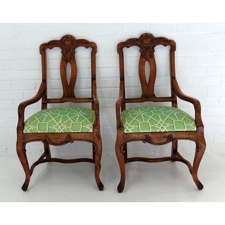 PAIR OF UPHOLSTERED CARVERS