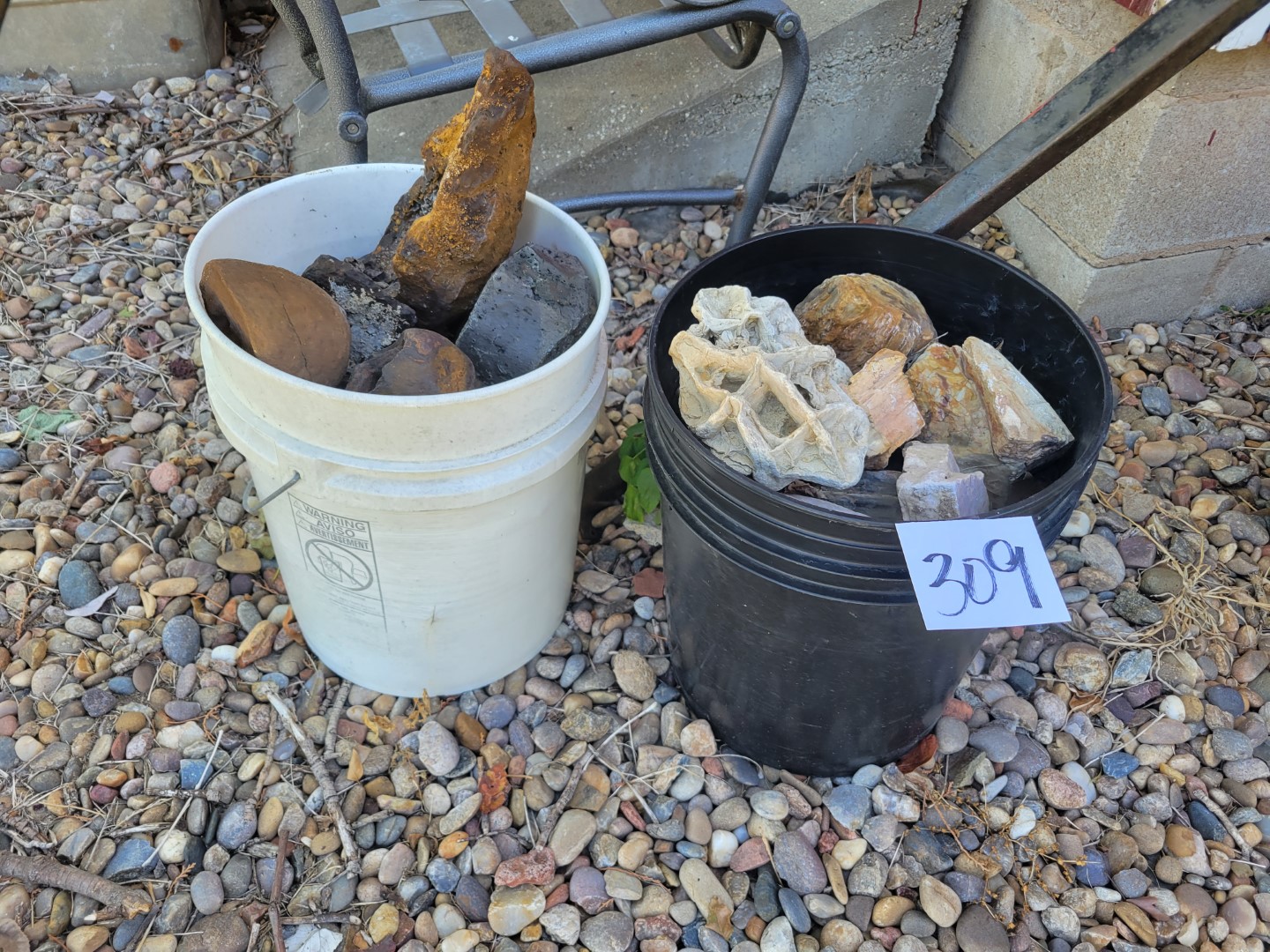 2 buckets of decorative rocks Midwest Auctions, LLC
