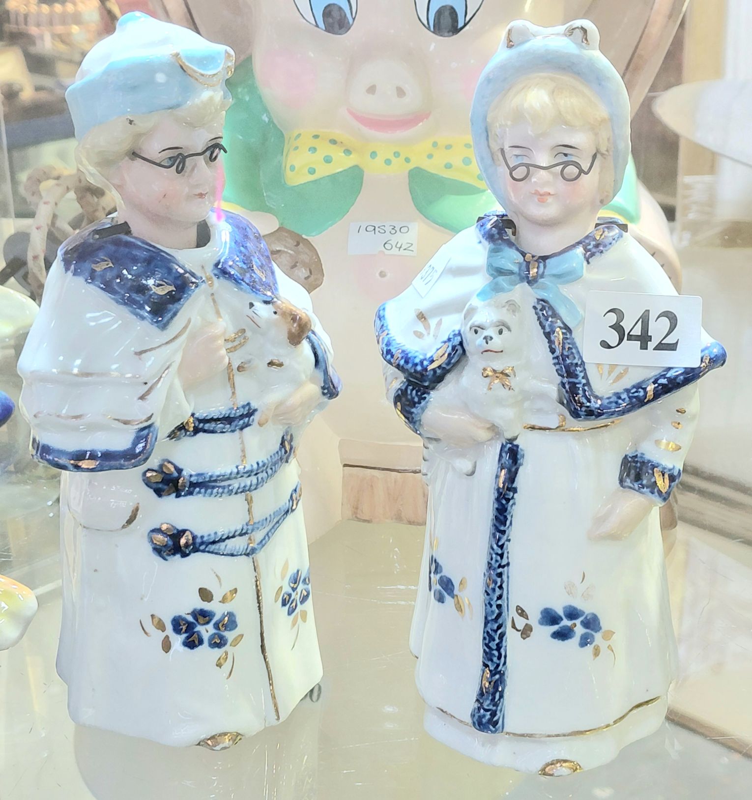 342 · PAIR OF CERAMIC NODDER FIGURINES