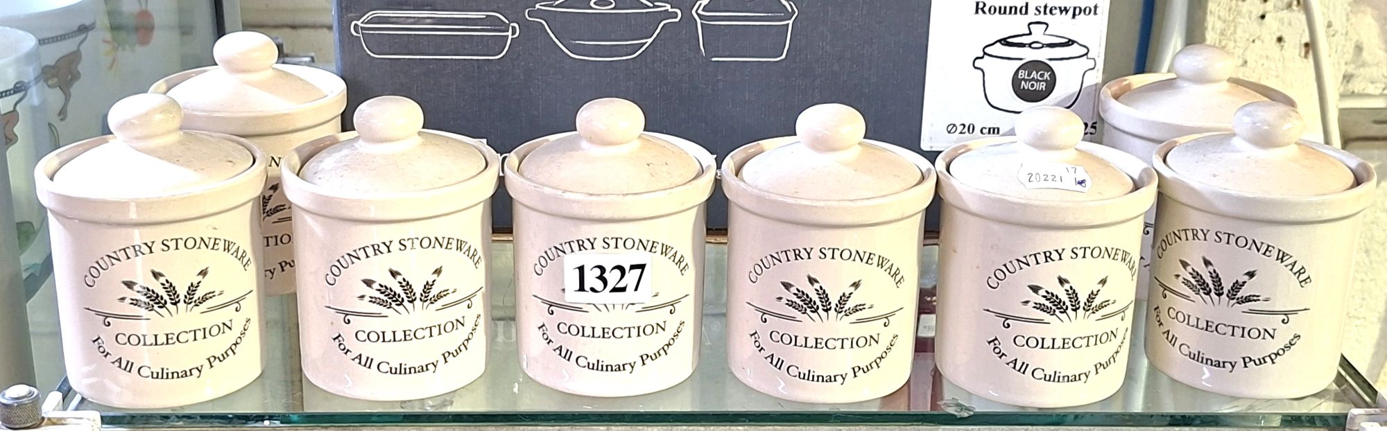1327 · EIGHT STONEWARE HIDDLED POTS