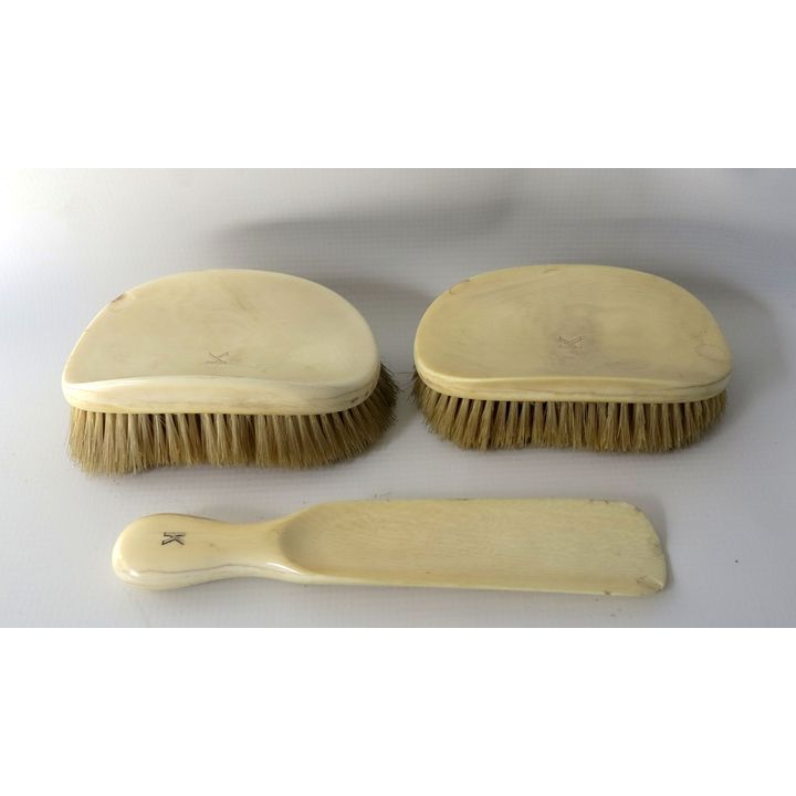 PAIR OF IVORY HAIR BRUSHES AND A SHOEHORN