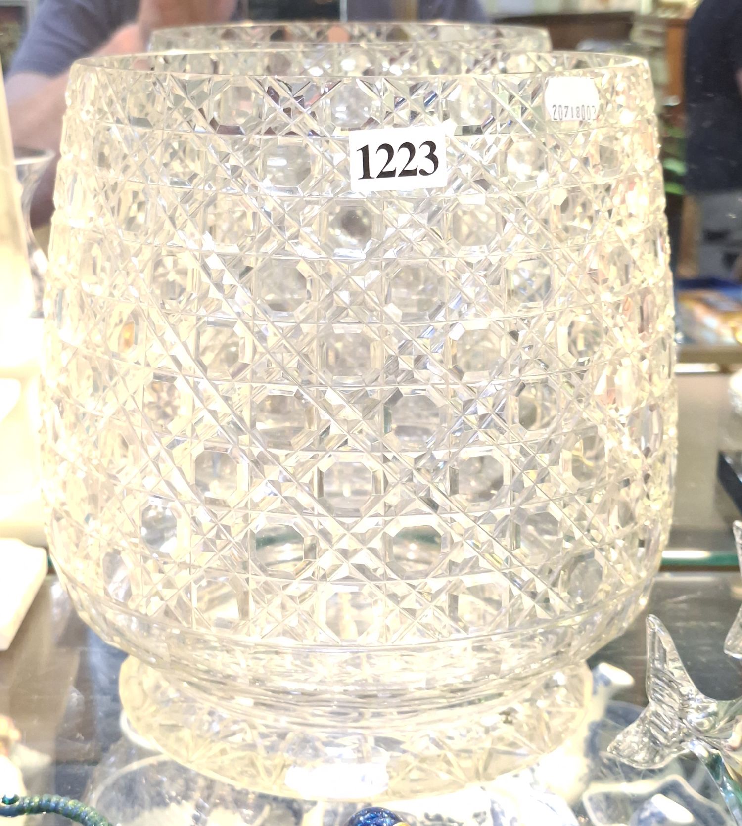 1223 · A LARGE CRYSTAL BARREL VASE