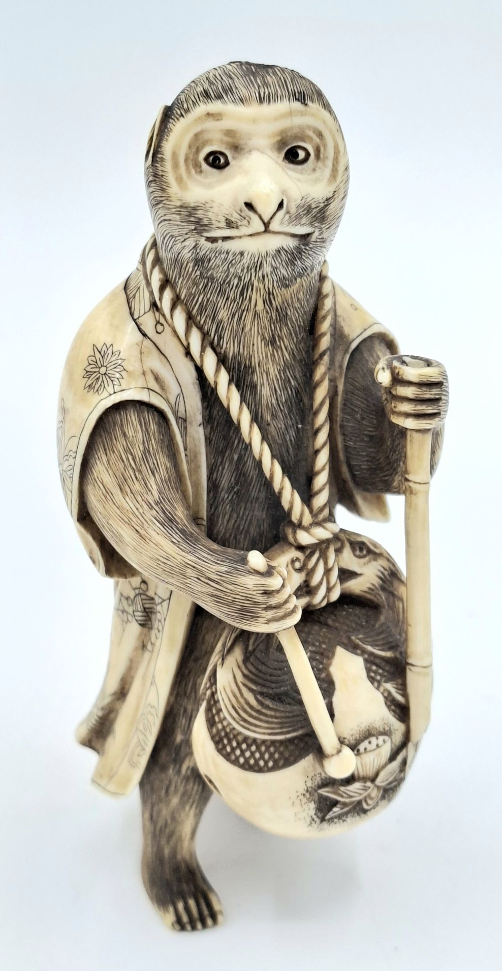 8 · AN EXCEPTIONAL JAPANESE CARVED IVORY FIGURE