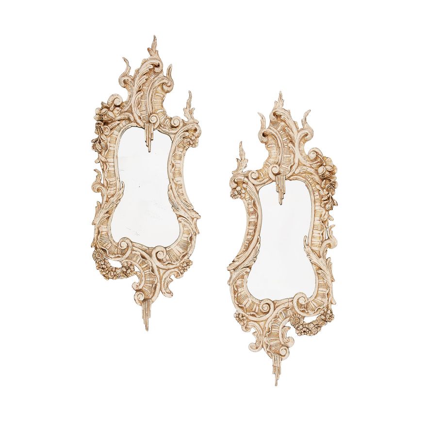 A pair of late 19th century rococo style carved mirrors