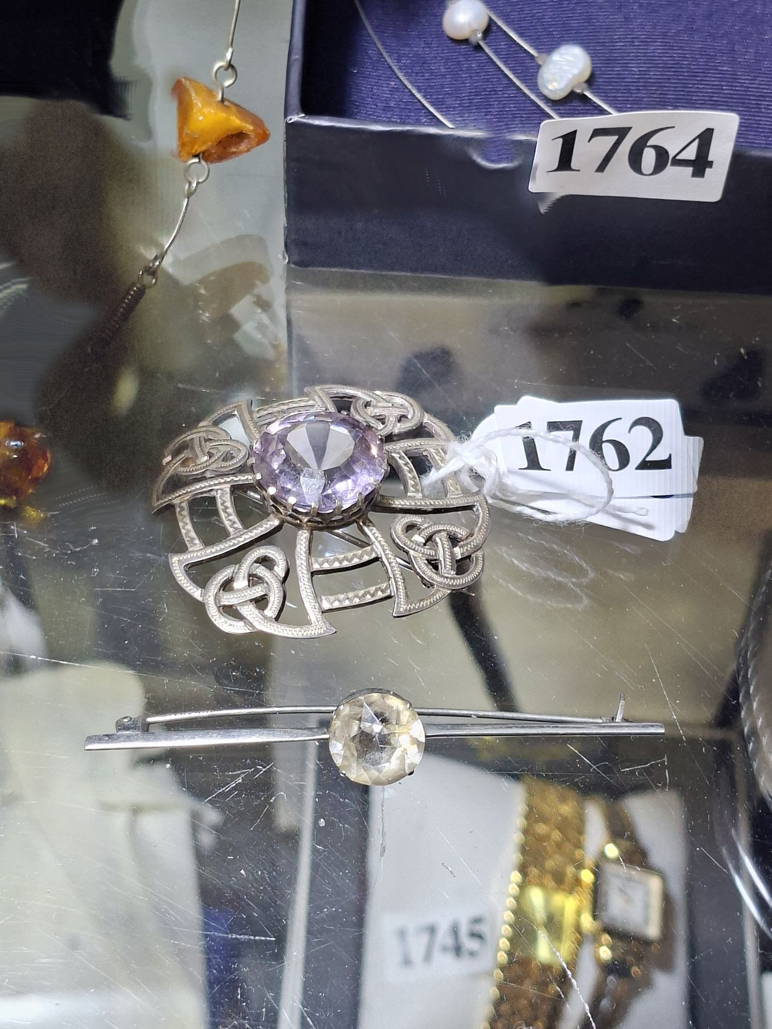 Celtic Knot And Stone Set Brooches