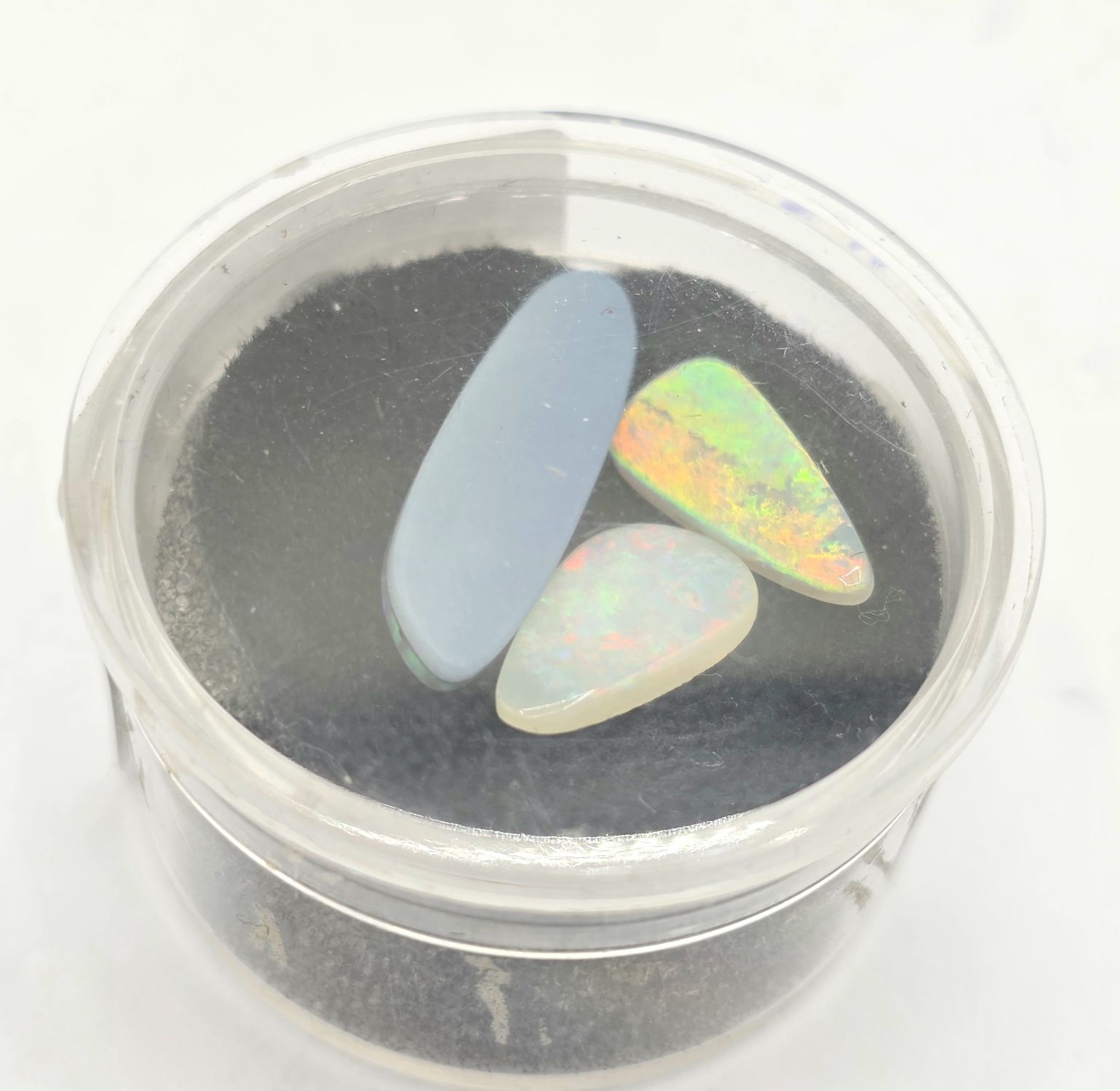 24 · THREE OPAL SPECIMENS