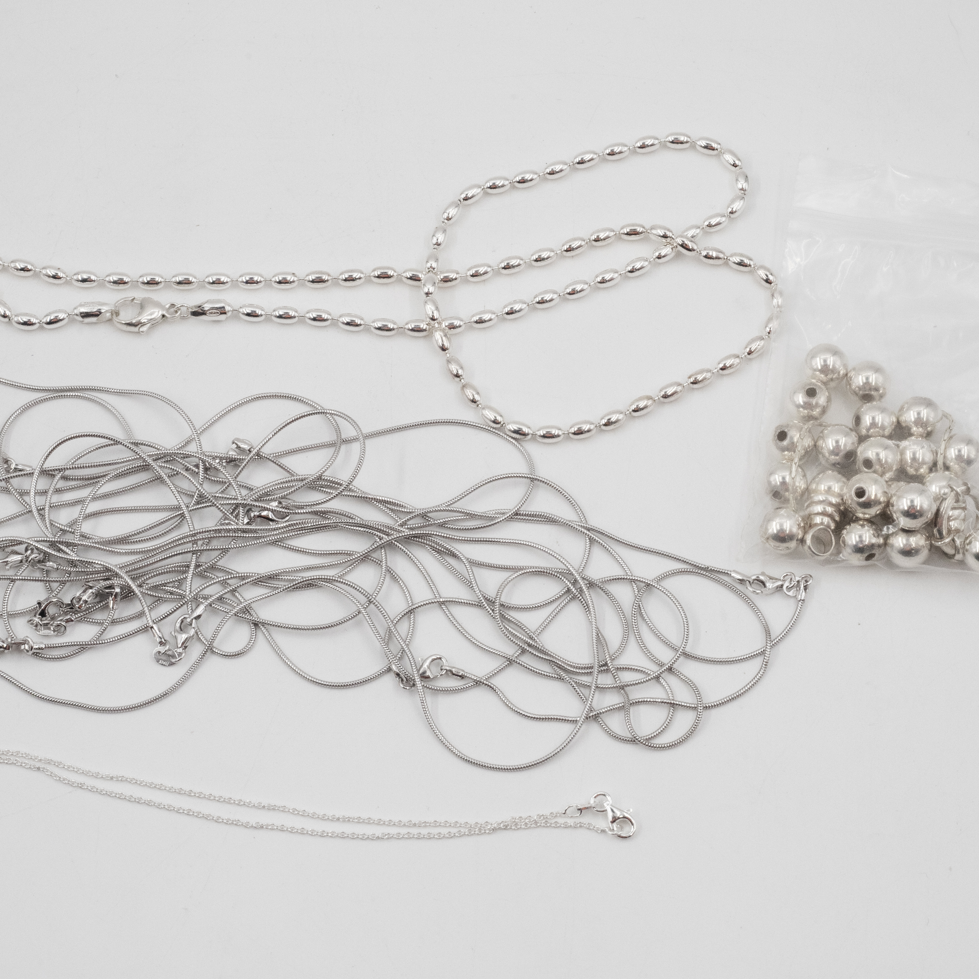 309 · Mix Lot of Silver Beads & Chains