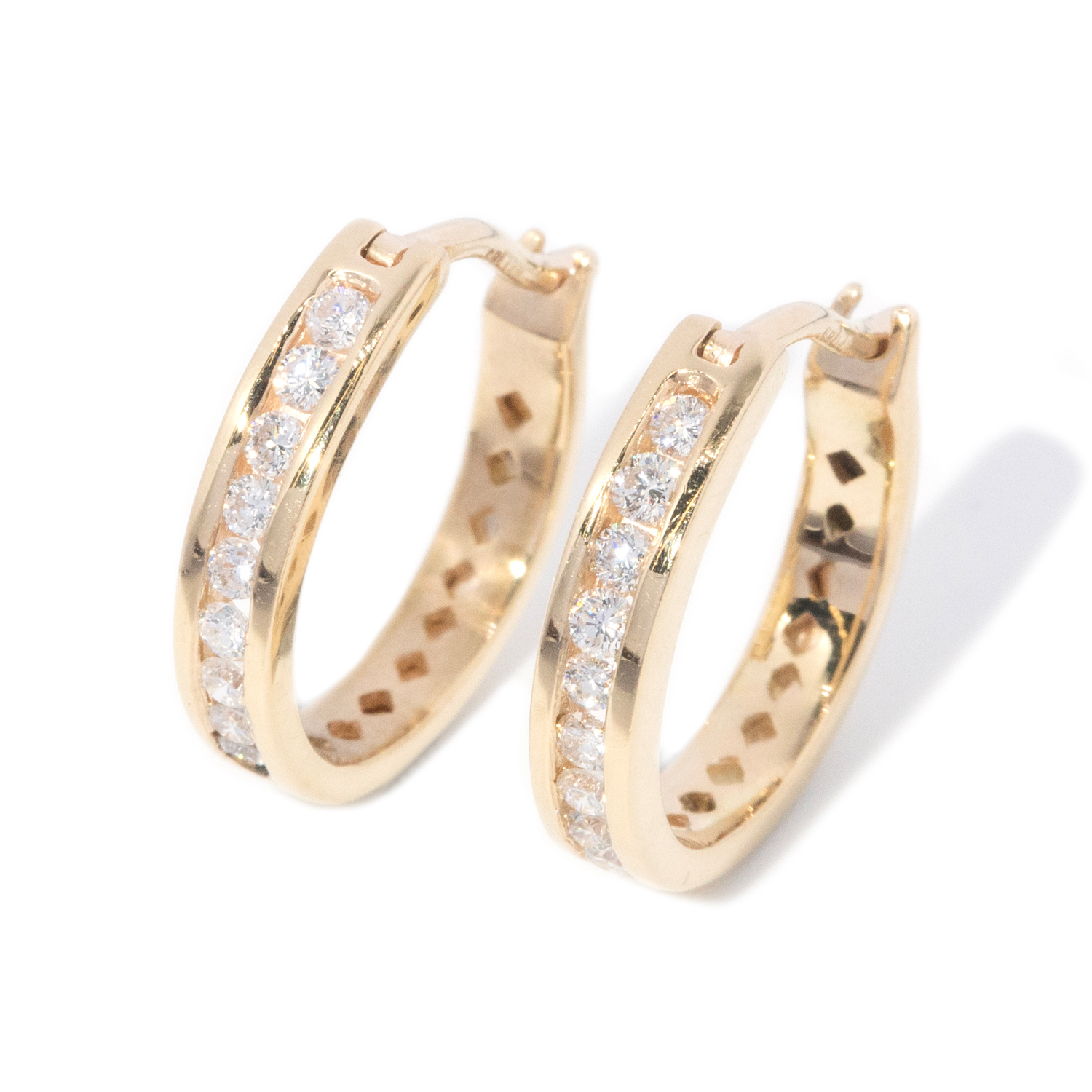 50 · Diamond Hoop Earrings in 14ct Gold