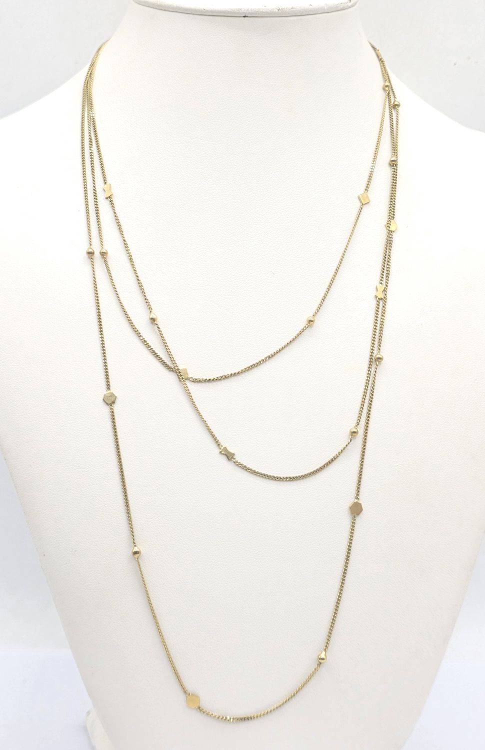 161 · ITALIAN 9CT GOLD TRIPLE STRAND NECKLACE