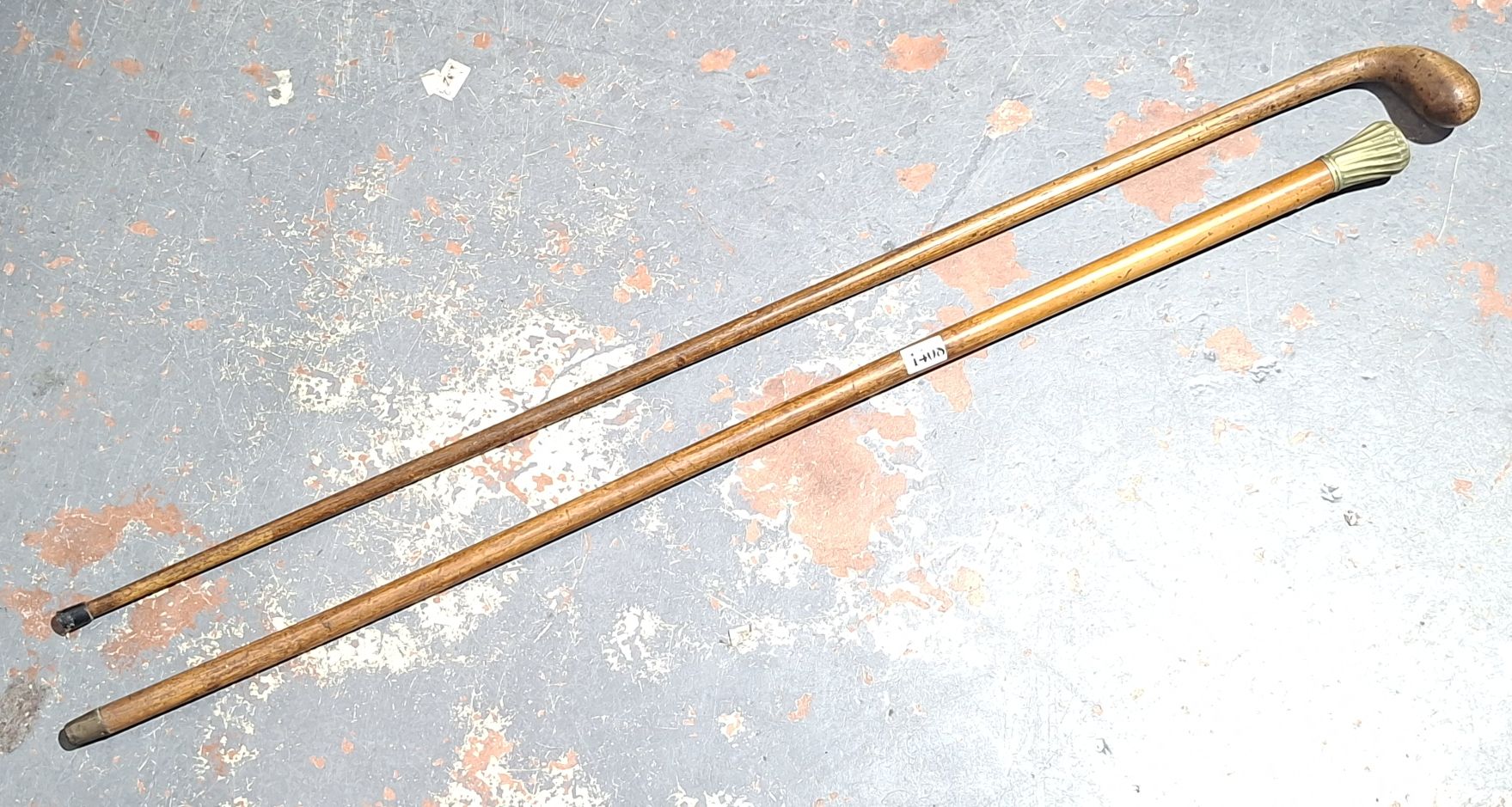 1408 · TWO ANTIQUE WALKING STICKS,
