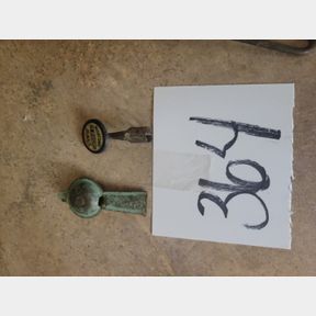Antique metal whistle and salt pencil advertising