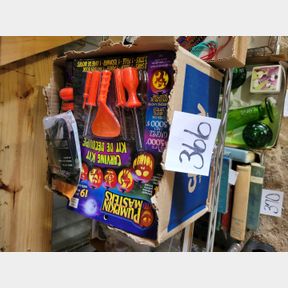 Assortment of Halloween pumpkin carving kit and costume