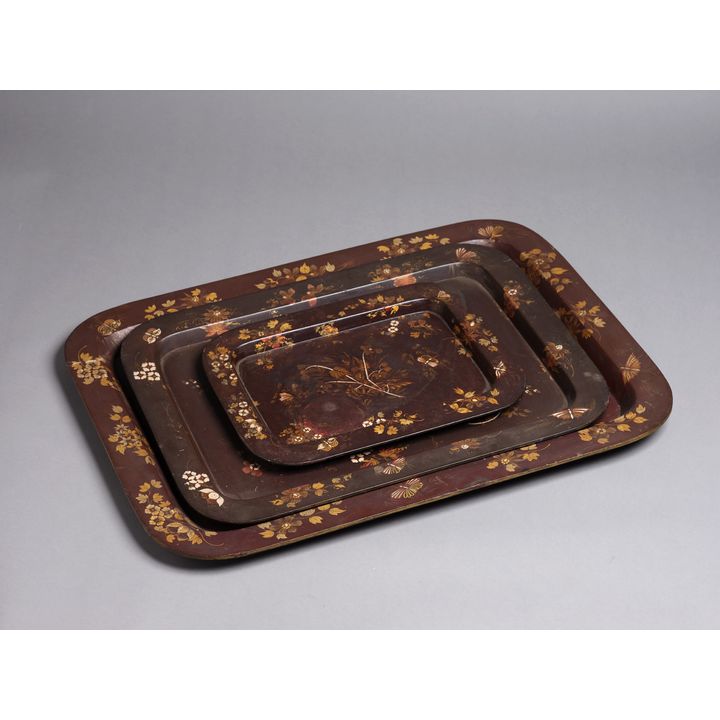 Set of three English painted and gilded papier Mache trays