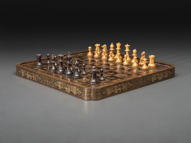 A Chinese Export Gilt Decorated Black Lacquer Folding Game Board