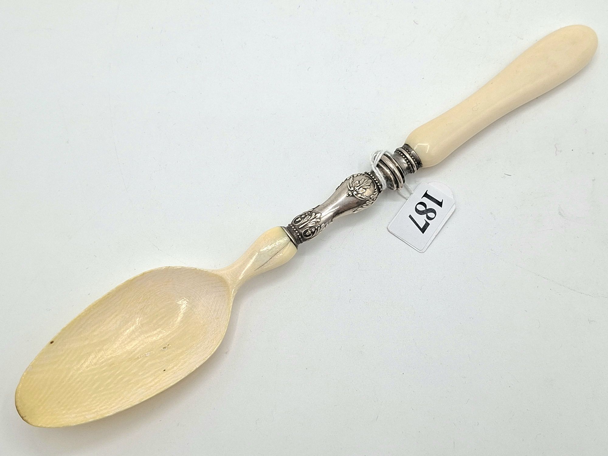 187 · ANTIQUE IVORY AND SILVER SPOON