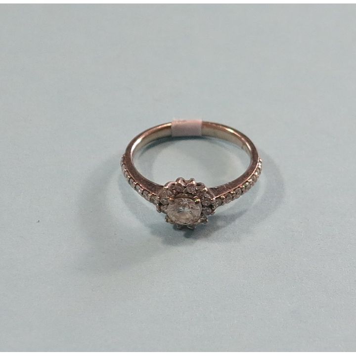 AN 18CT WIHITE GOLD AND DIAMOND HALO RING
