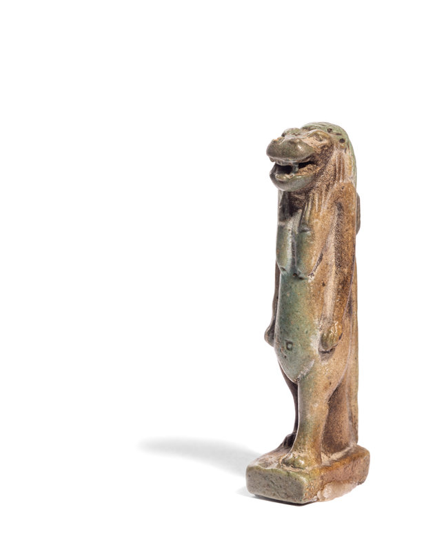 An Egyptian Faience Tawaret
Height 2 3/4 inches (7 cm).