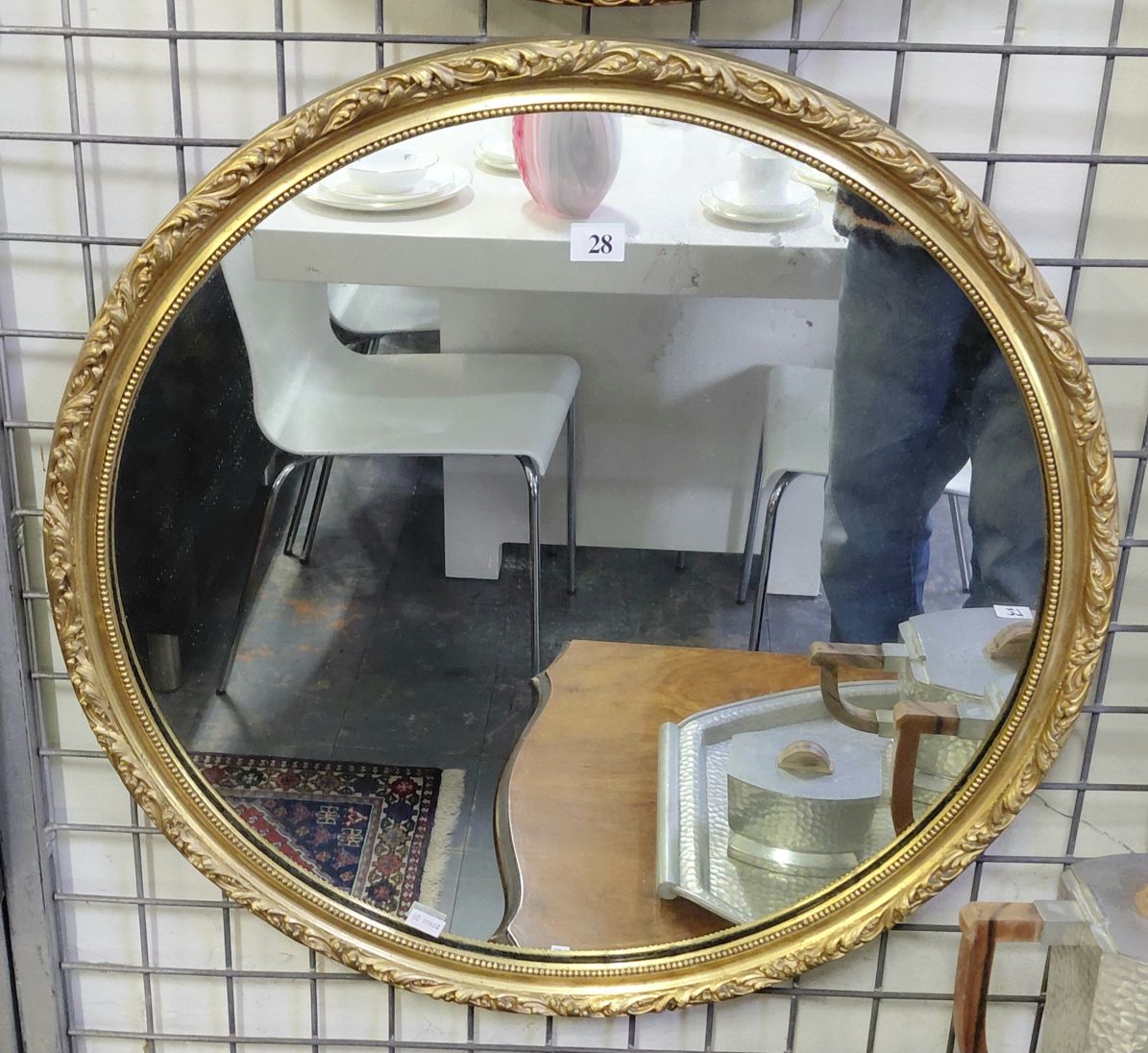 28 · CIRCULAR GILT FRAMED MIRROR
