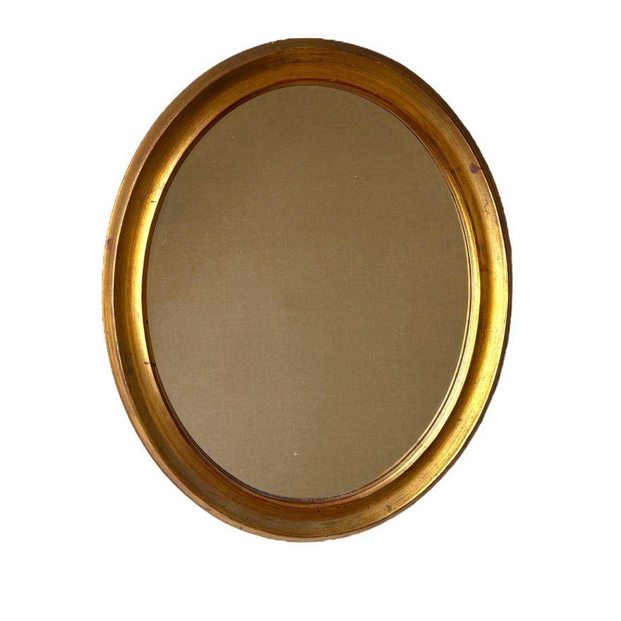 A vintage Clark-Eaton giltwood oval mirror