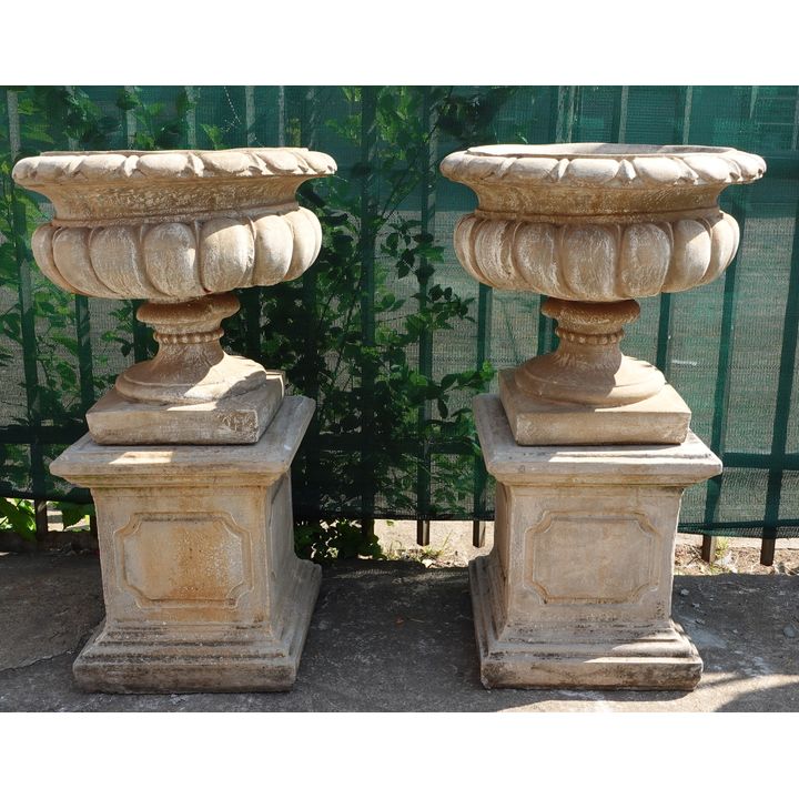PAIR OF CONCRETE URNS AND STAND