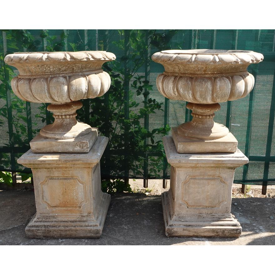 PAIR OF CONCRETE URNS AND STAND